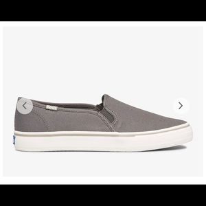 Keds double decker washable canvas shoe. New, never worn. In original box.